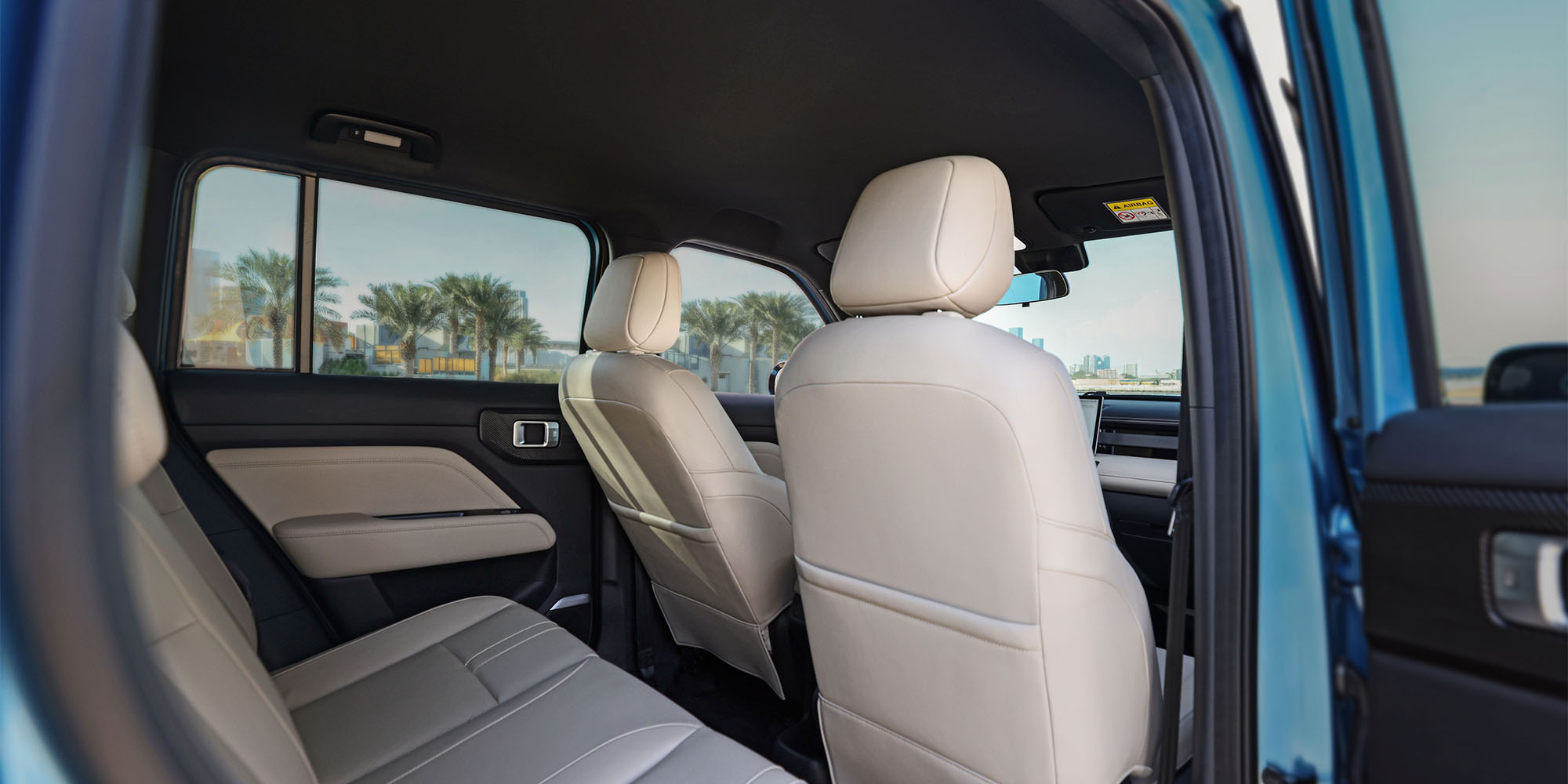 Asientos traseros del Chevrolet Spark EUV color beige